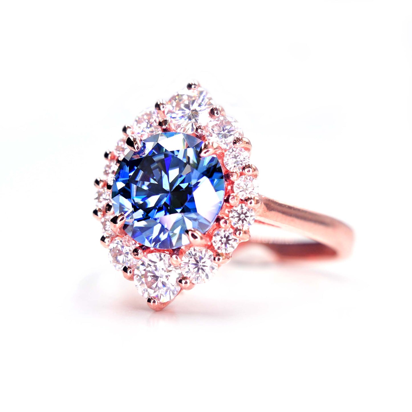 Handmade blue moissanite ring in solid 14k rose gold is available in Chiang Mai, Thailand