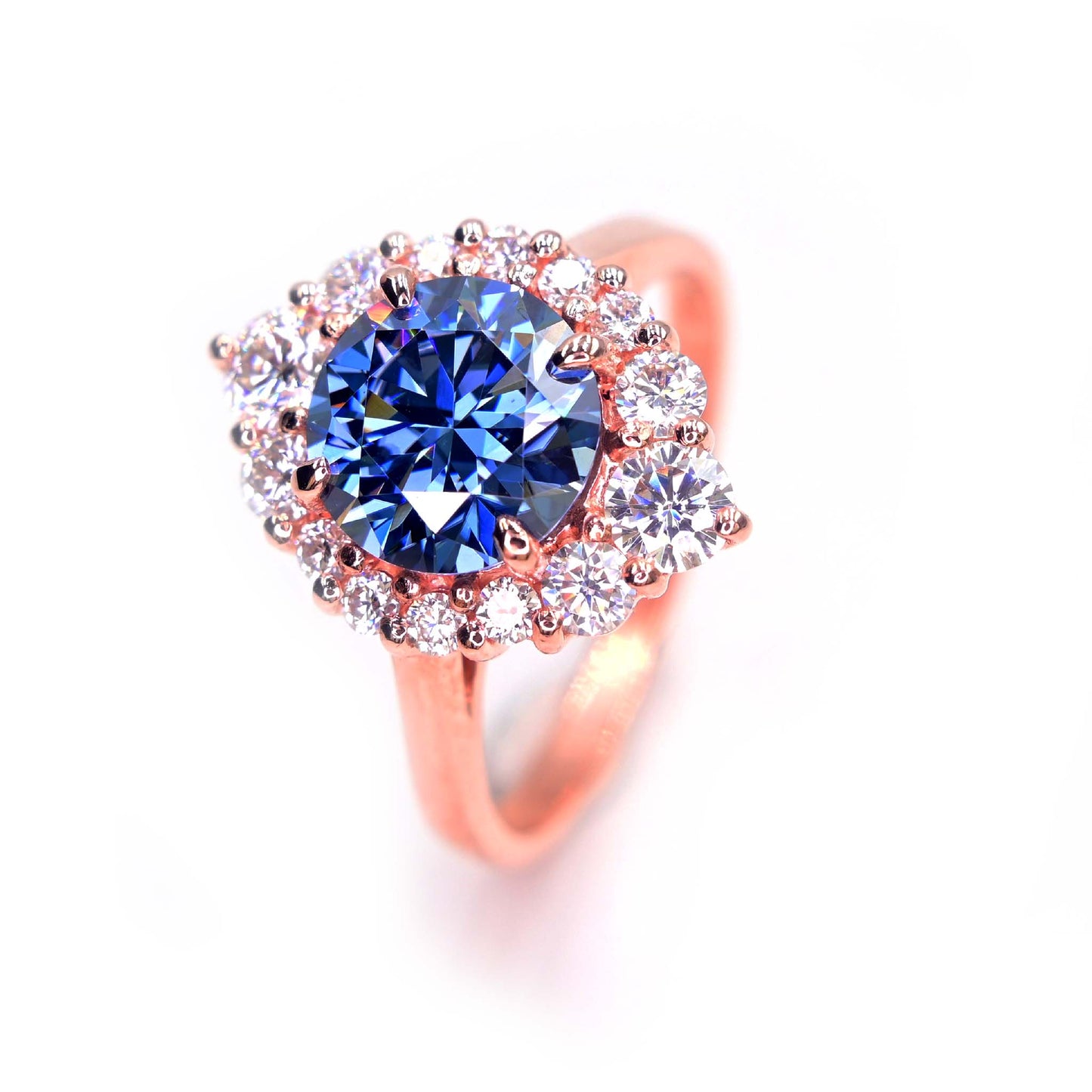 Handmade blue moissanite ring in solid 14k rose gold is available in Chiang Mai, Thailand