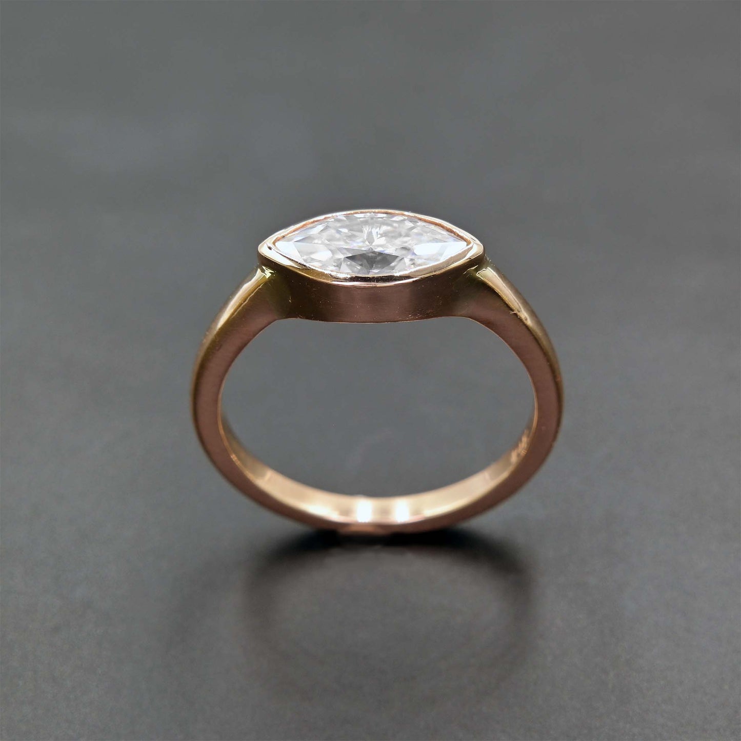 Marquise engagement ring handmade with earth-friendly moissanite and 14k rose gold