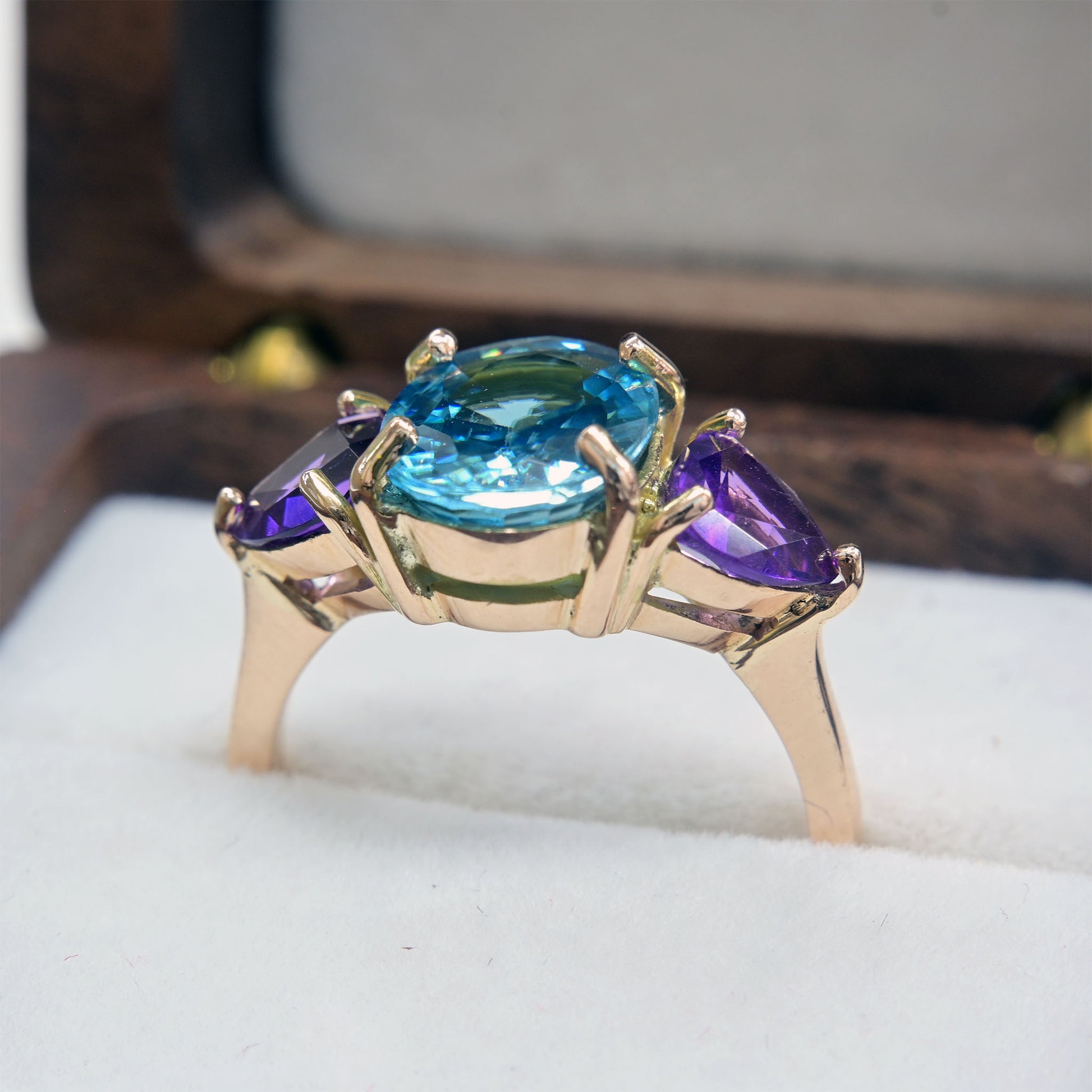Natural blue zircon ring with amethysts