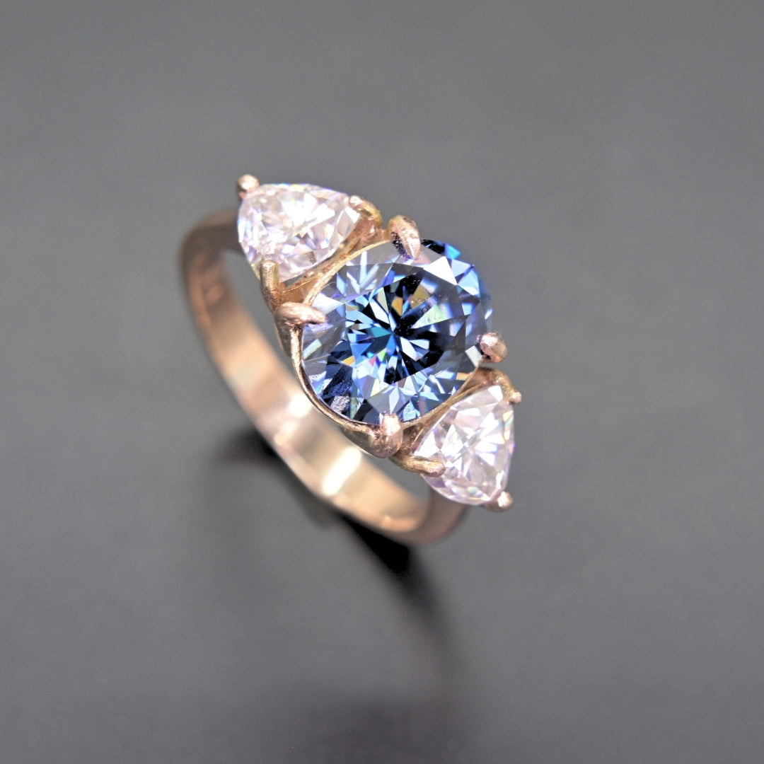 14K Gold Blue Moissanite Ring with Pear Side Stones