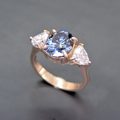 Blue Oval Moissanite Engagement Ring with Side Stones by Shiraz Jewelry