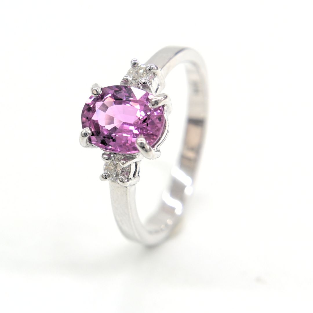 Handmade 18K white gold ring with a 1.76ct natural pink sapphire and two accent diamonds by Shiraz Jewelry, Chiang Mai, Thailand.