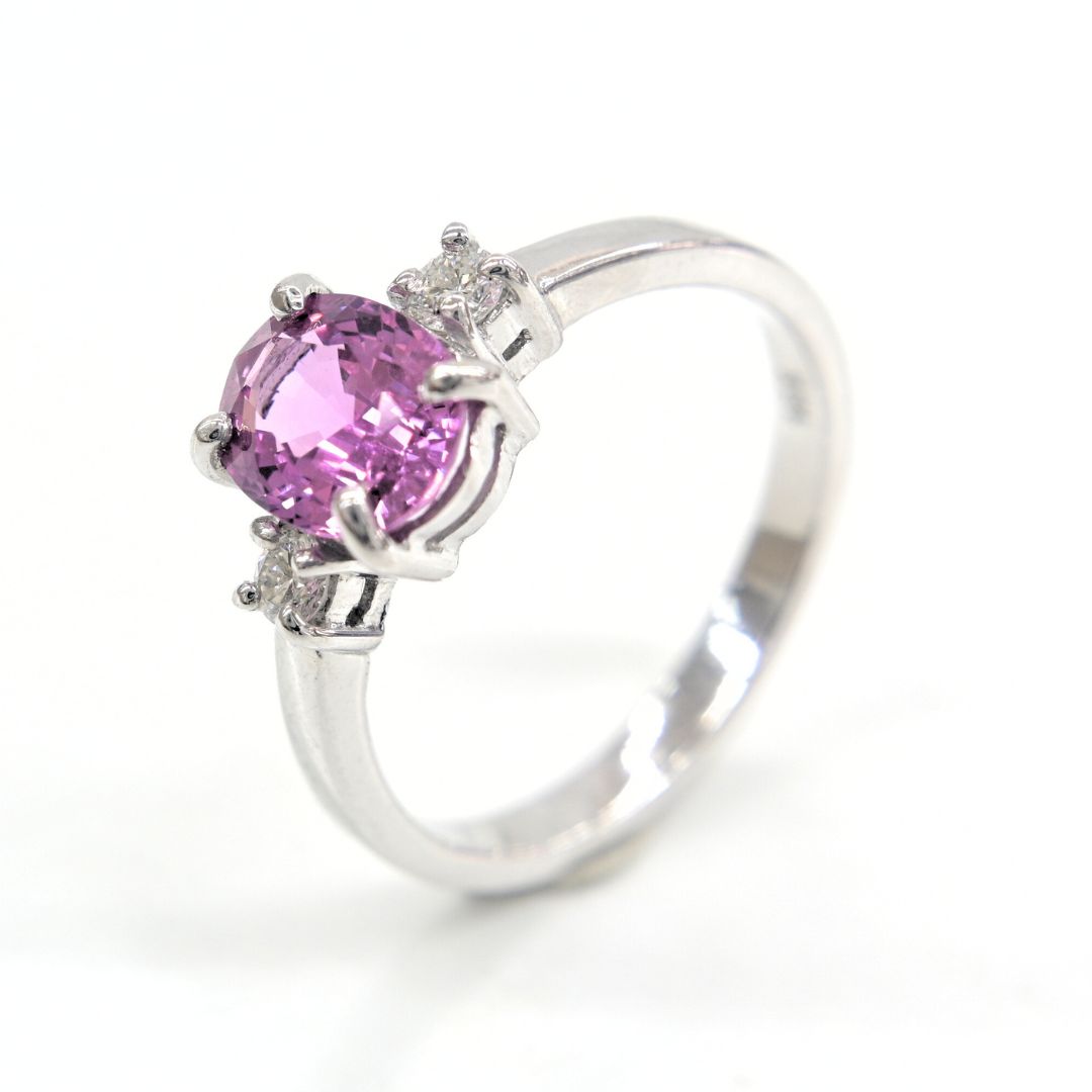 Handmade 18K white gold ring with a 1.76ct natural pink sapphire and two accent diamonds by Shiraz Jewelry, Chiang Mai, Thailand.