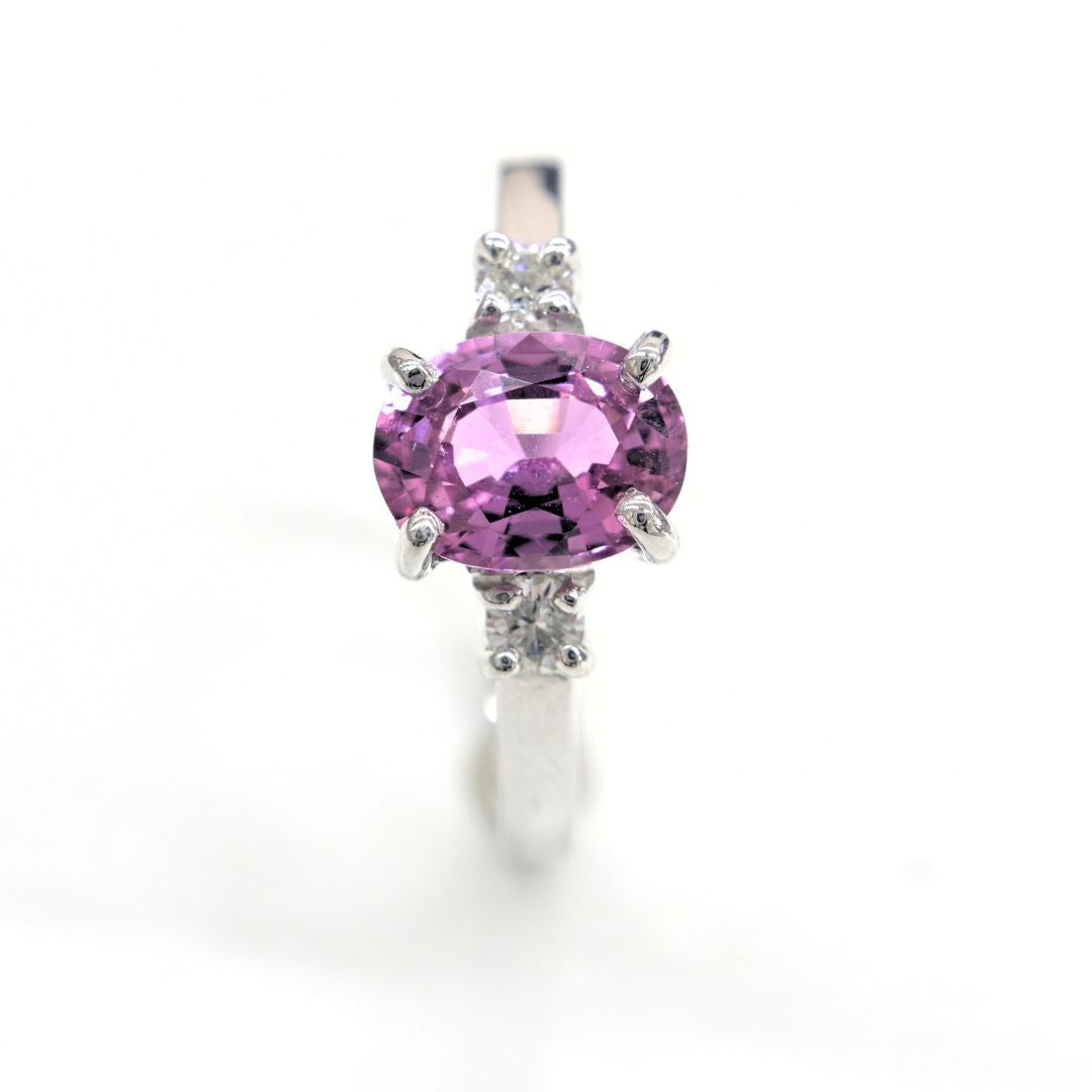Handmade 18K white gold ring with a 1.76ct natural pink sapphire and two accent diamonds by Shiraz Jewelry, Chiang Mai, Thailand.