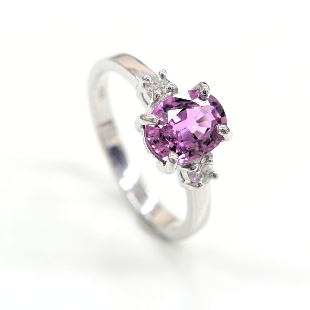 Handmade 18K white gold ring with a 1.76ct natural pink sapphire and two accent diamonds by Shiraz Jewelry, Chiang Mai, Thailand.