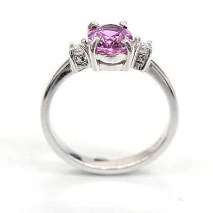 Handmade 18K white gold ring with a 1.76ct natural pink sapphire and two accent diamonds by Shiraz Jewelry, Chiang Mai, Thailand.