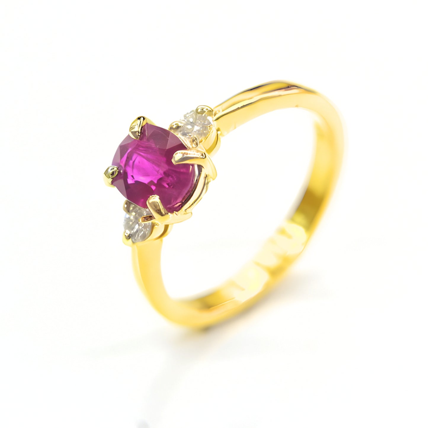 Handcrafted 18K yellow gold ruby ring with two white diamonds