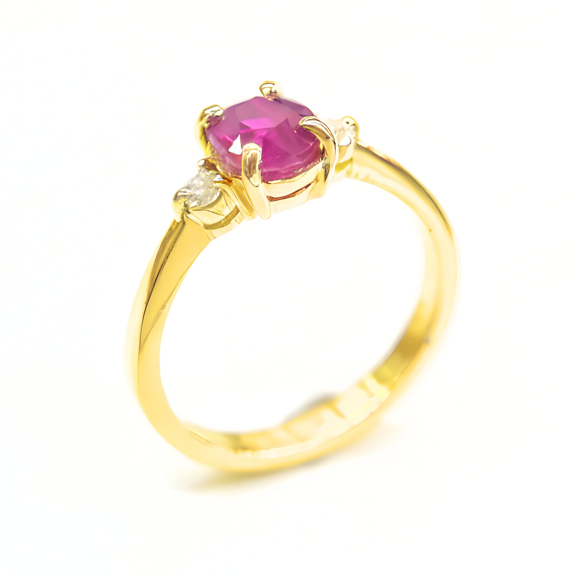 Natural ruby gemstone ring with diamond sides in 18K gold