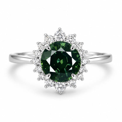 Thai green sapphire ring with 16 natural diamonds set in 18K white gold by Shiraz Jewelry