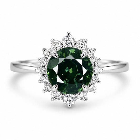 Thai green sapphire ring with 16 natural diamonds set in 18K white gold by Shiraz Jewelry