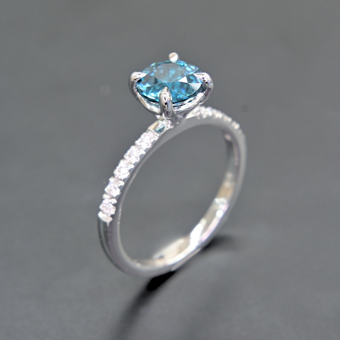 Elegant white gold blue zircon engagement style ring