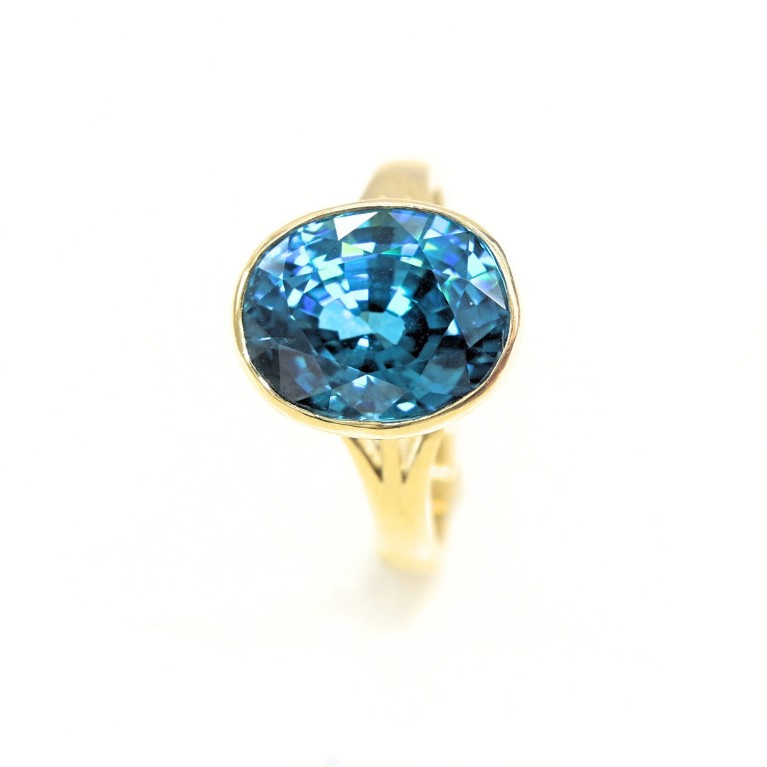 Aurora Zircon – Handcrafted 18K Gold Blue Zircon Ring | Shiraz Jewelry Chiang Mai