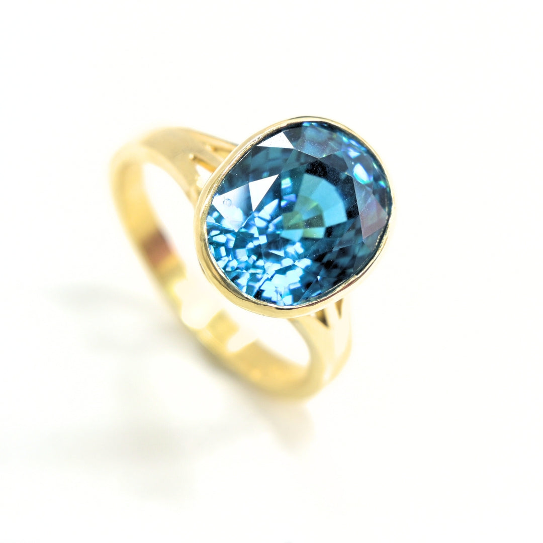 Aurora Zircon – Handcrafted 18K Gold Blue Zircon Ring | Shiraz Jewelry Chiang Mai