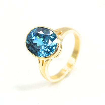Aurora Zircon – Handcrafted 18K Gold Blue Zircon Ring | Shiraz Jewelry Chiang Mai