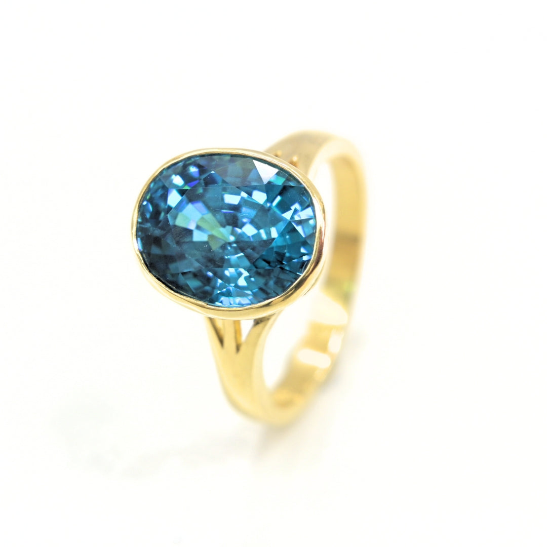 Aurora Zircon – Handcrafted 18K Gold Blue Zircon Ring | Shiraz Jewelry Chiang Mai