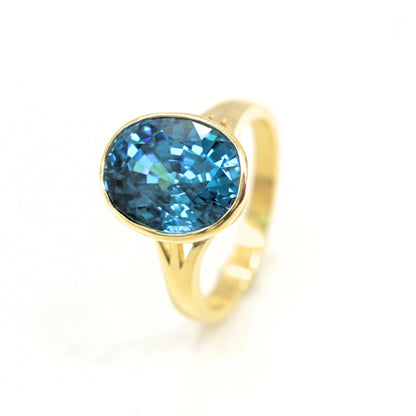Aurora Zircon – Handcrafted 18K Gold Blue Zircon Ring | Shiraz Jewelry Chiang Mai