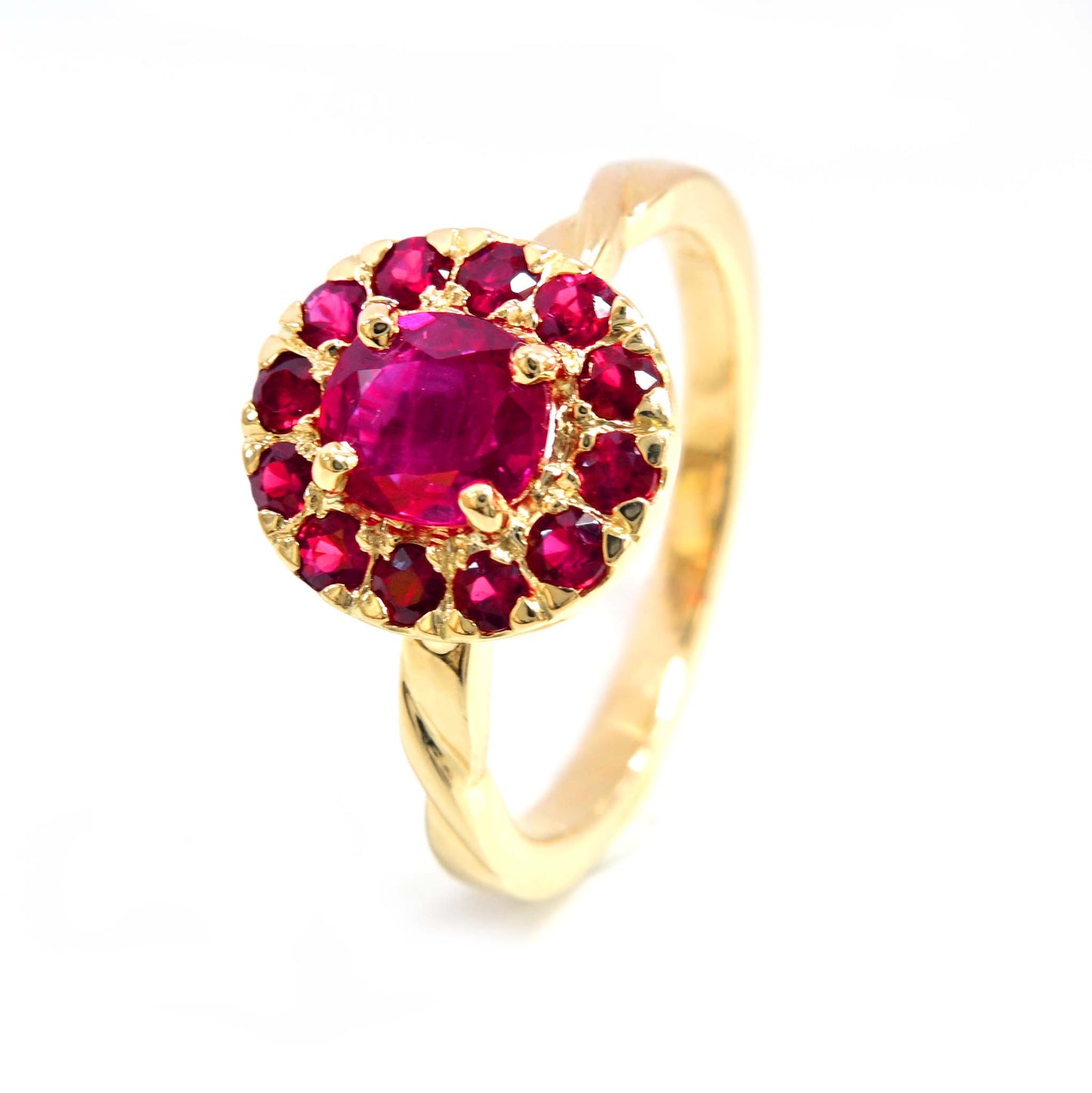 Eye-catching ruby ring with a radiant halo, perfect for special occasions.