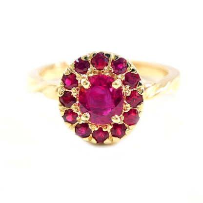 Unique ruby ring featuring a halo design, adding a touch of luxury to any outfit.