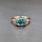 Front view of Natural blue zircon in 14k romantic rose gold