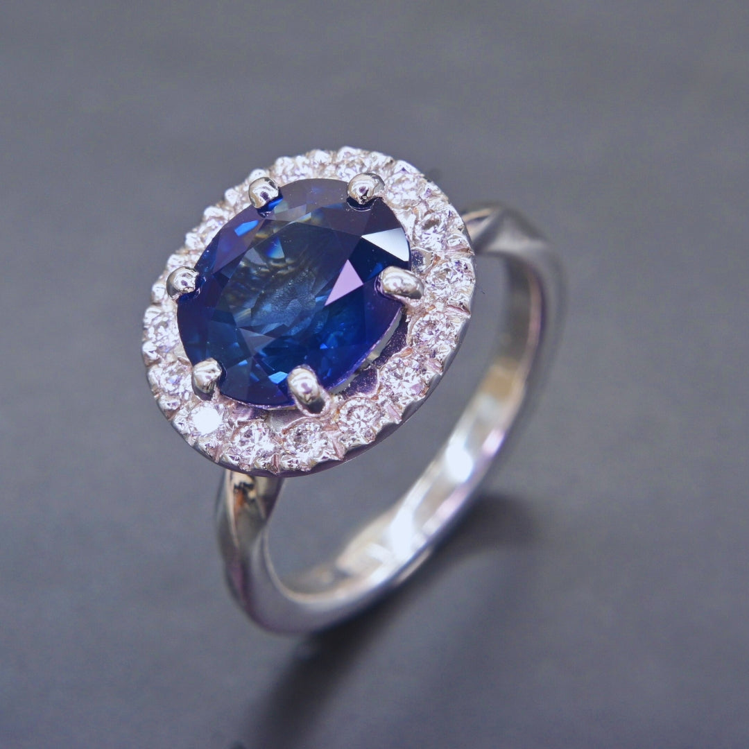 Fine jewelry blue sapphire engagement ring with diamond accents