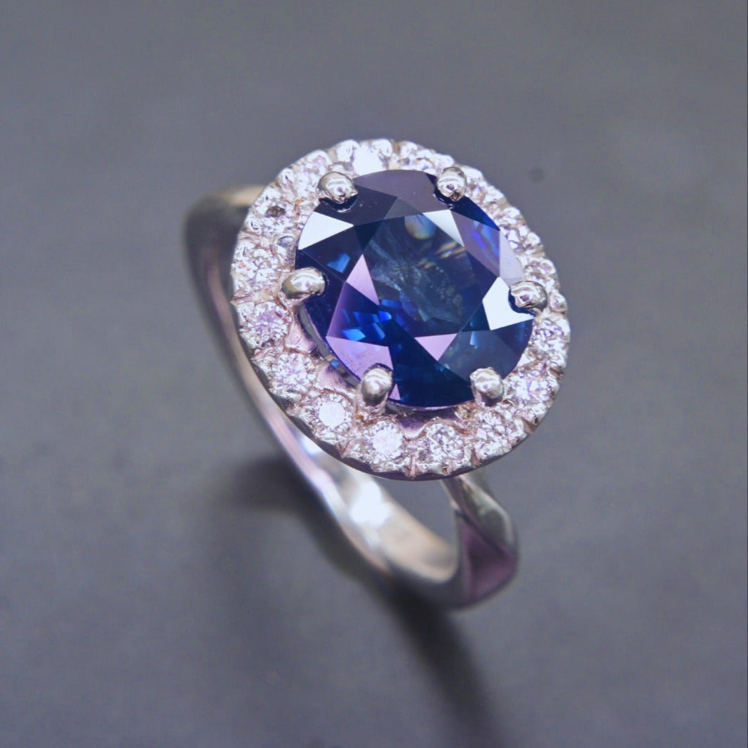 Elegant handmade sapphire and diamond engagement ring in white gold