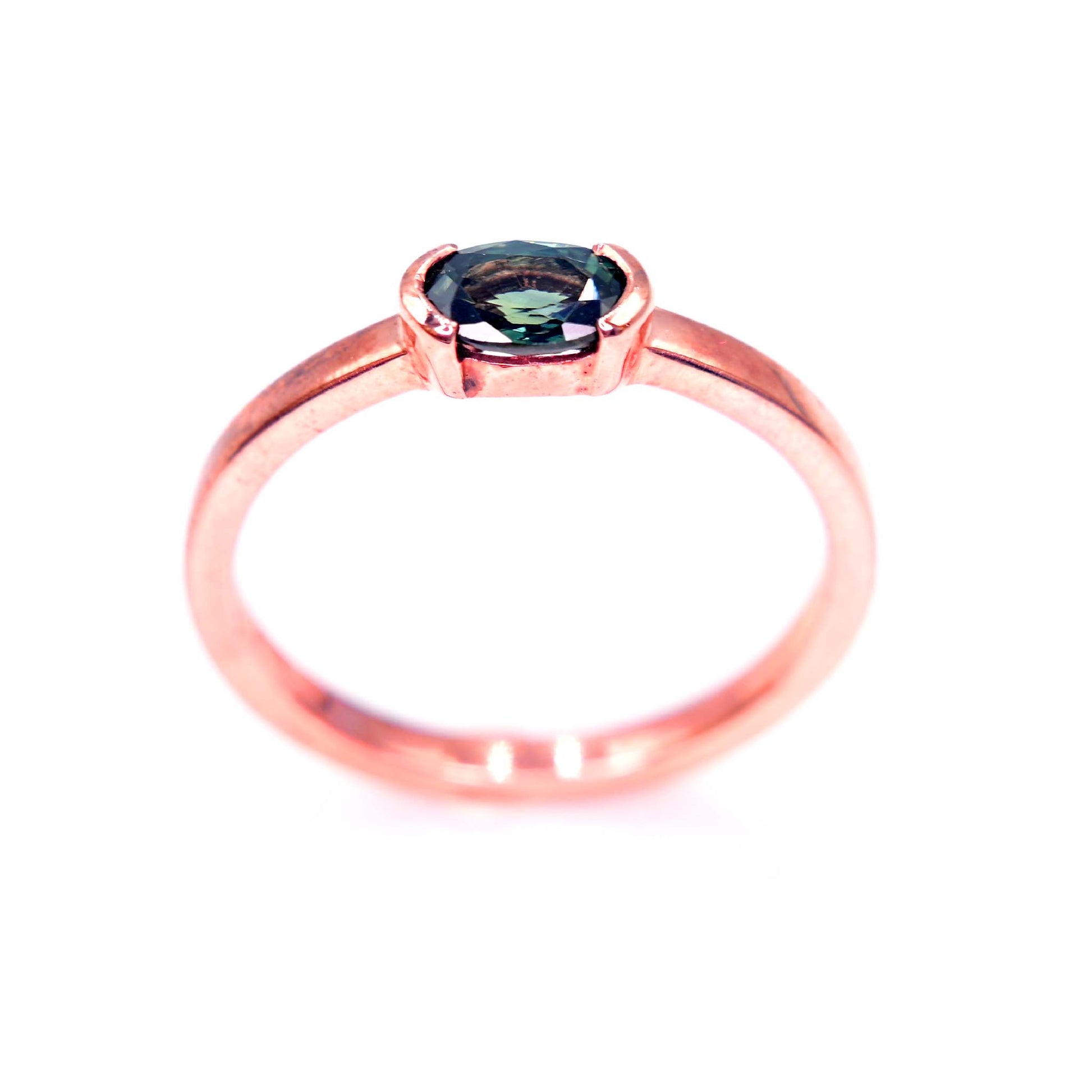 Top view of Thai Green sapphire ring in 14k rose gold