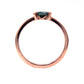 Solid build of this green sapphire ring in 14k rose gold