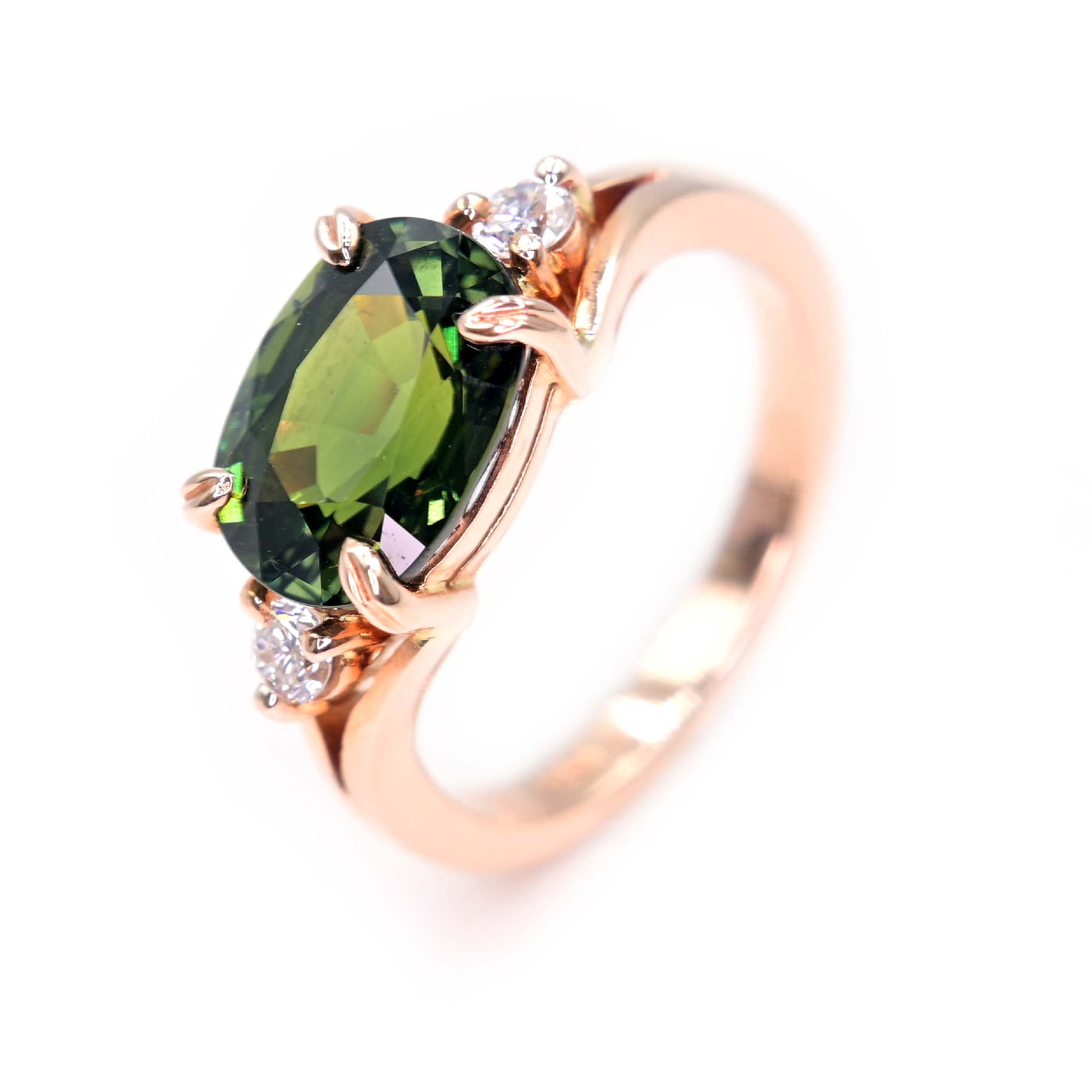 Forest green sapphire ring made with Thai green sapphire and natural diamonds