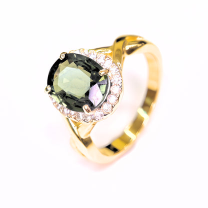 Artisan green sapphire ring with diamond halo made by Shiraz Jewelry Thailand