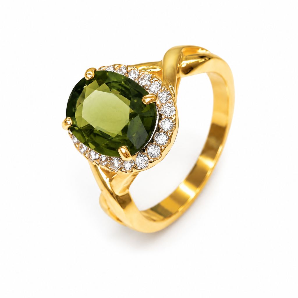 Oval green sapphire ring in solid 14K yellow gold featuring a brilliant diamond halo and modern twisted band, luxury gemstone engagement or statement ring.