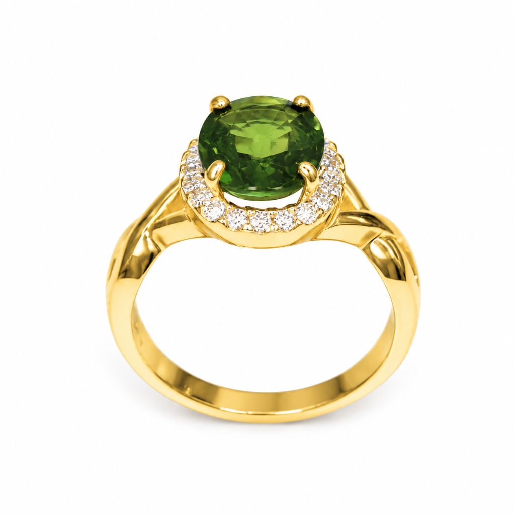 Natural green sapphire halo ring crafted in 14K yellow gold with round brilliant diamonds, handcrafted fine jewelry perfect for anniversaries and special occasions.