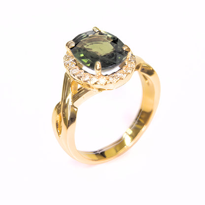 Natural green sapphire halo ring with diamonds in solid 14K gold
