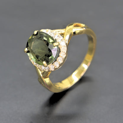 Luxury green sapphire and diamond halo ring handcrafted in Chiang Mai