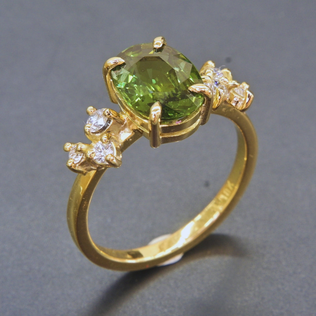 Unique green sapphire gemstone ring with six sparkling diamonds for women
