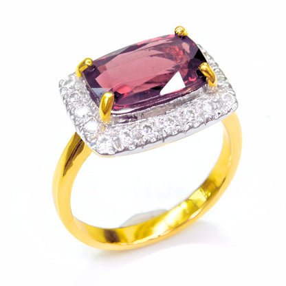 Luxury statement ring featuring 4.12ct Rhodolite Garnet in 18K yellow gold
