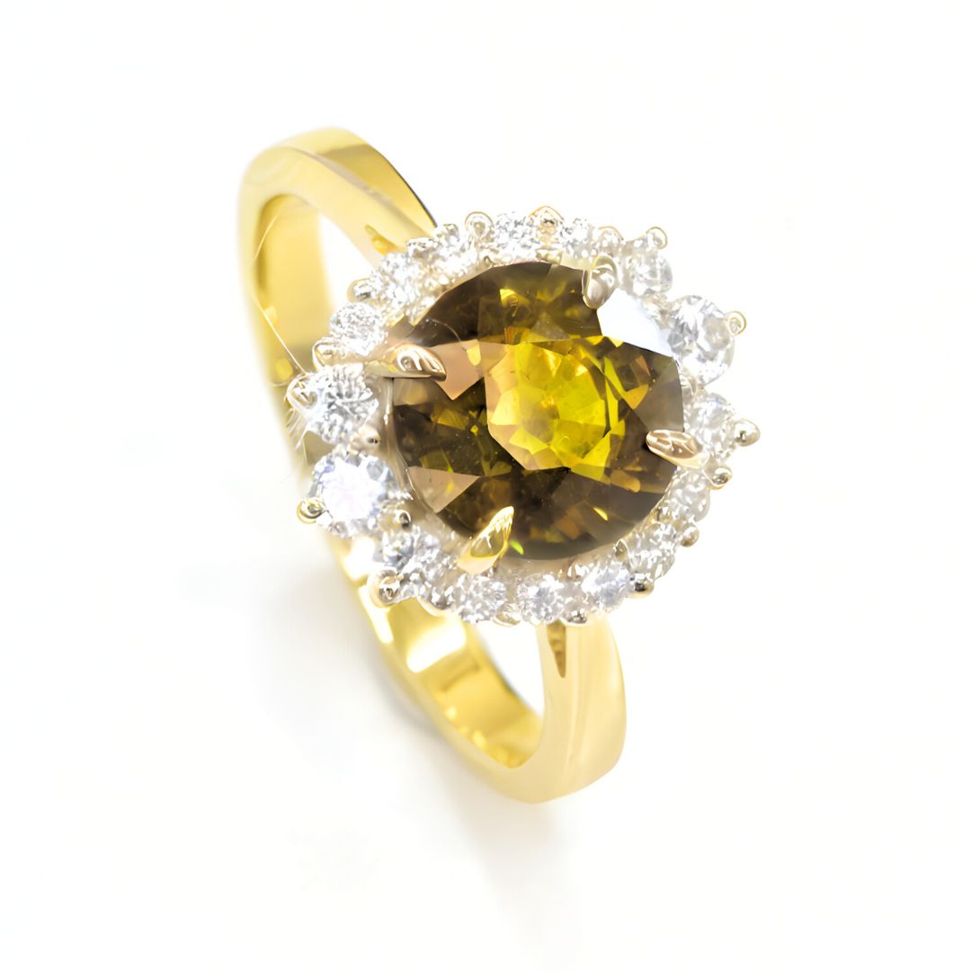 Sapphire engagement ring with halo of natural white diamonds