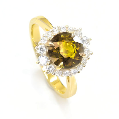 Sapphire engagement ring with halo of natural white diamonds