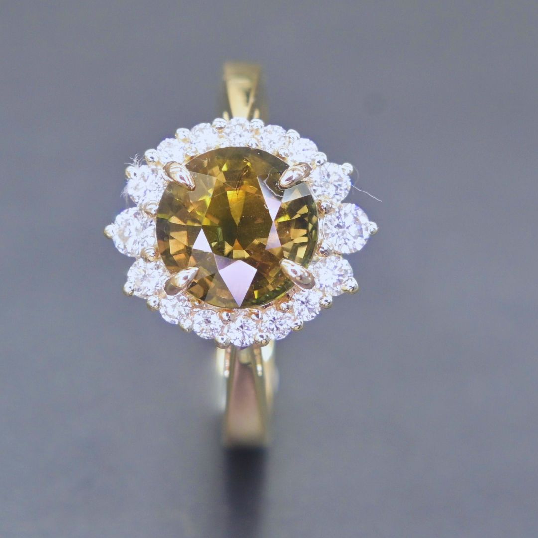 Handmade sapphire and diamond ring in yellow gold setting