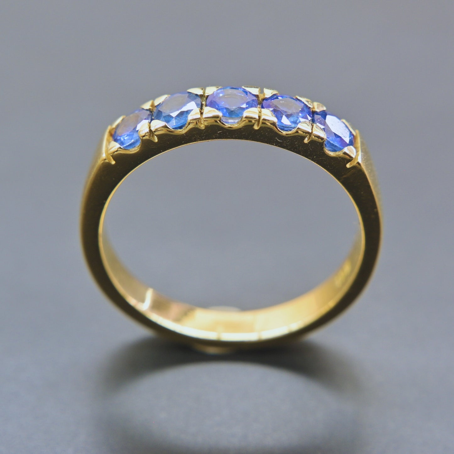 Handmade blue sapphire band ring by Chiang Mai artisan jeweler