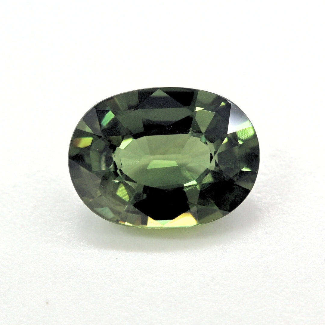 Oval cut 2.35 carat natural green sapphire mined in Thailand, very clean with excellent luster, loose gemstone for jewelry making.