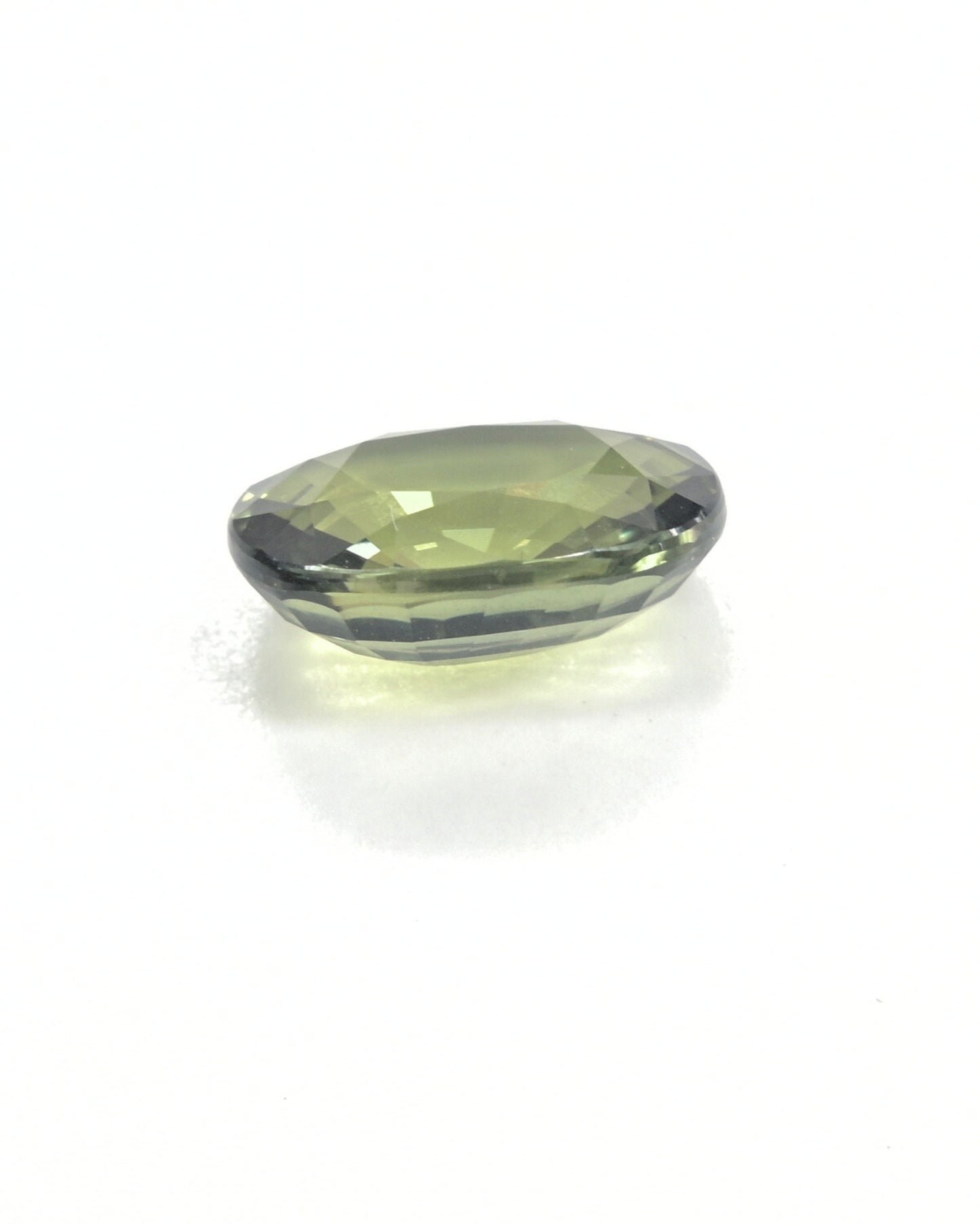Oval-shaped 3.32 carat unheated green sapphire.