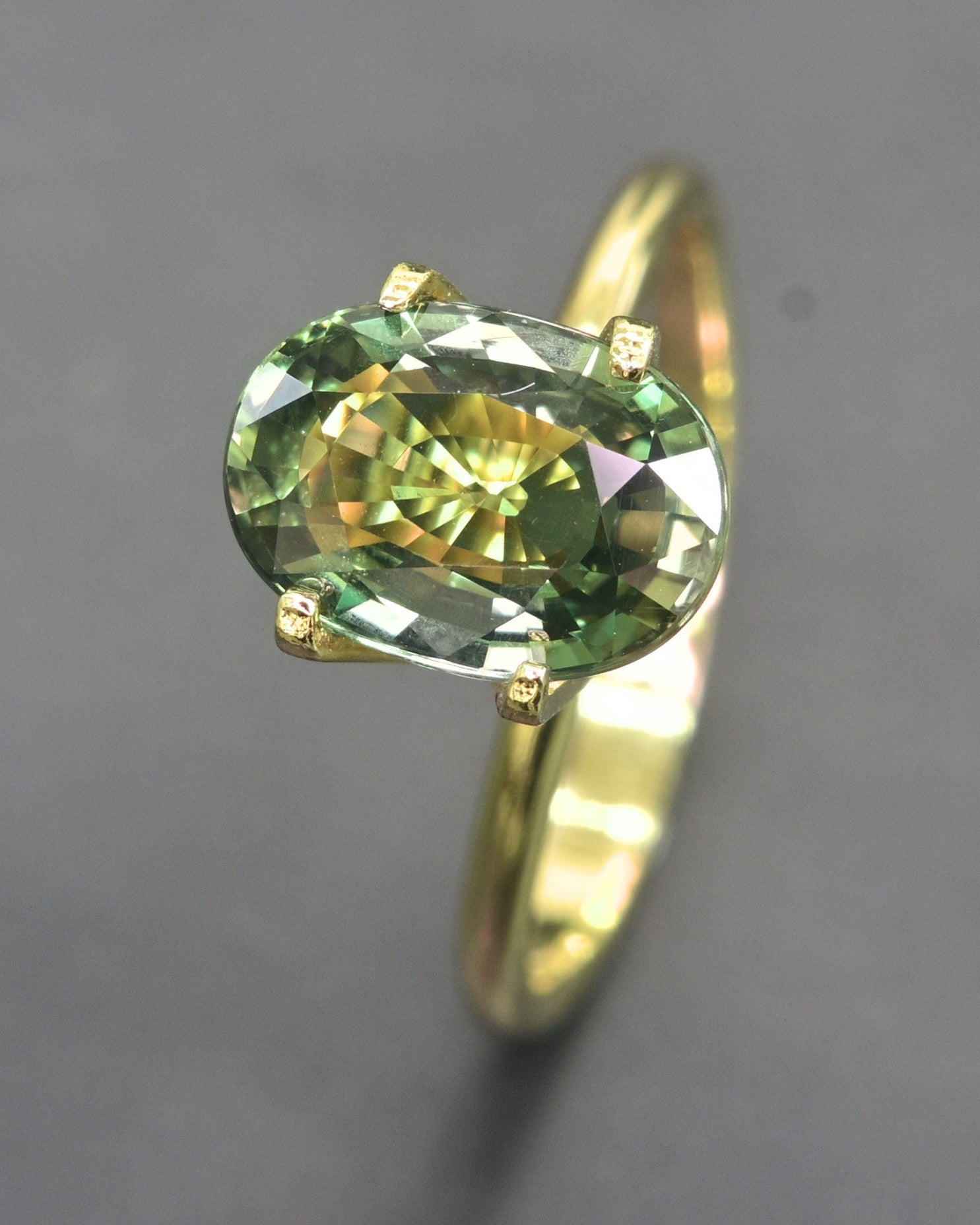 Rare 3.32 ct unheated olive green sapphire gemstone, ideal for collectors.