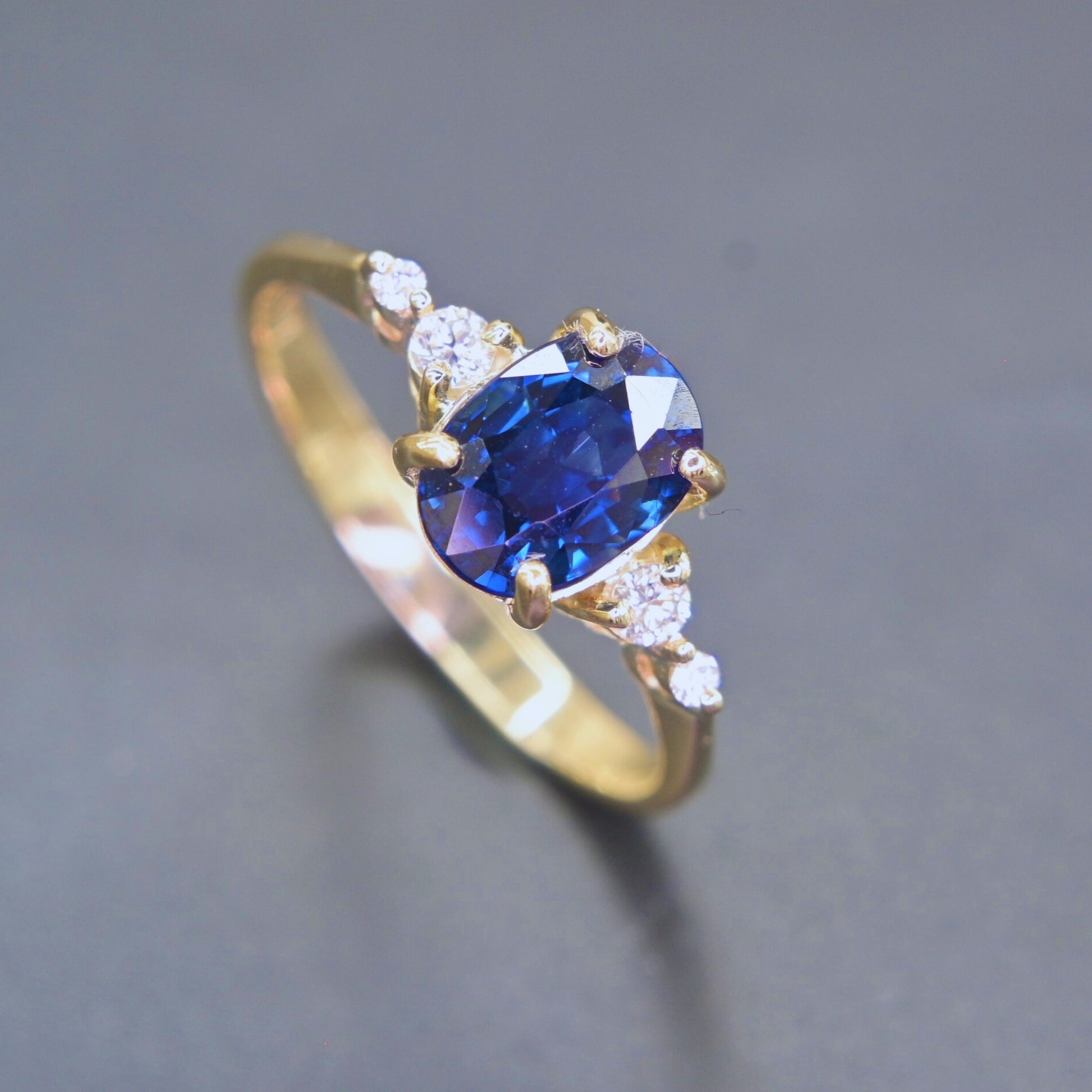 Oval cut natural blue sapphire engagement ring claw setting