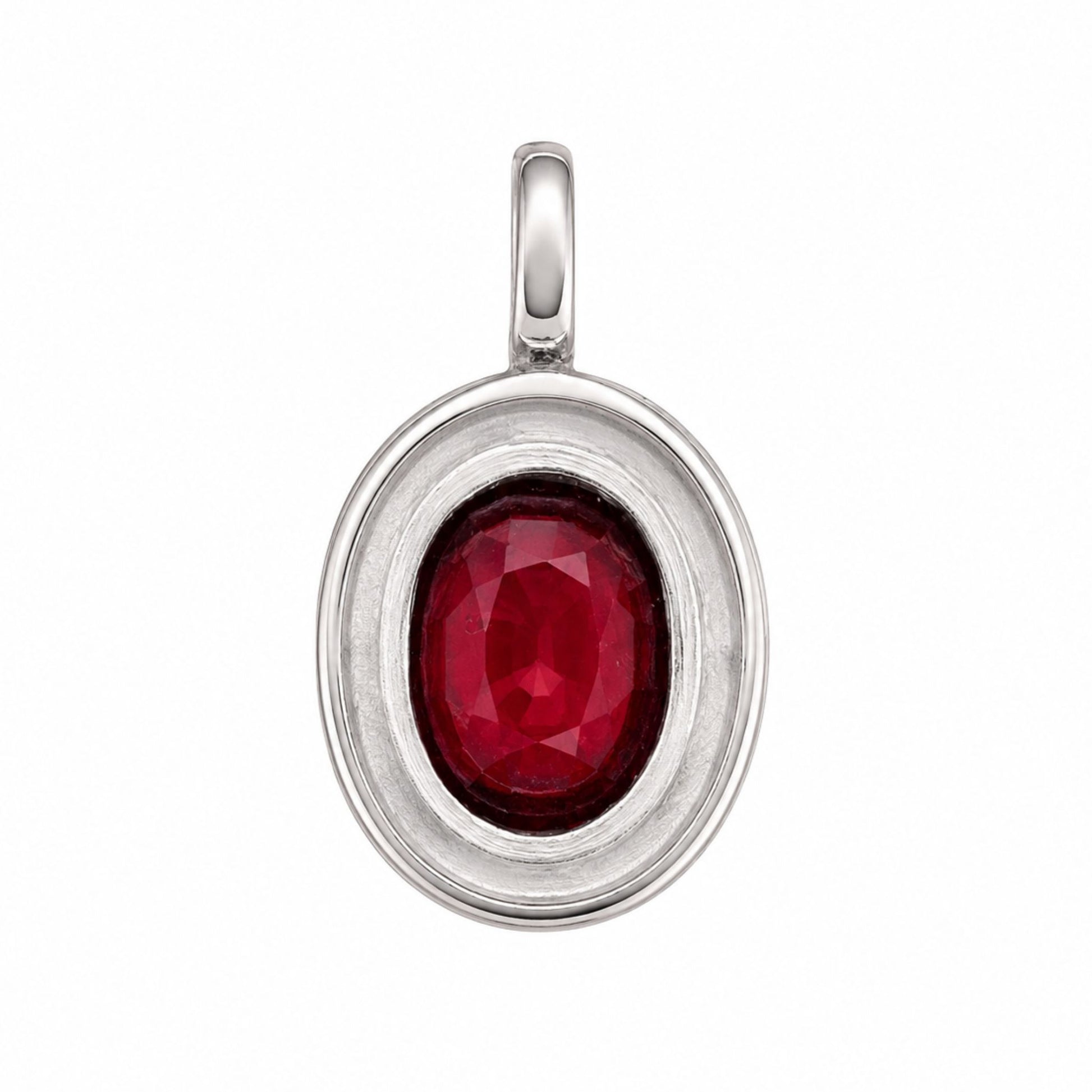 Close-up of a 3.02 carat rhodolite garnet bezel-set in solid 925 sterling silver pendant, handcrafted in Chiang Mai.