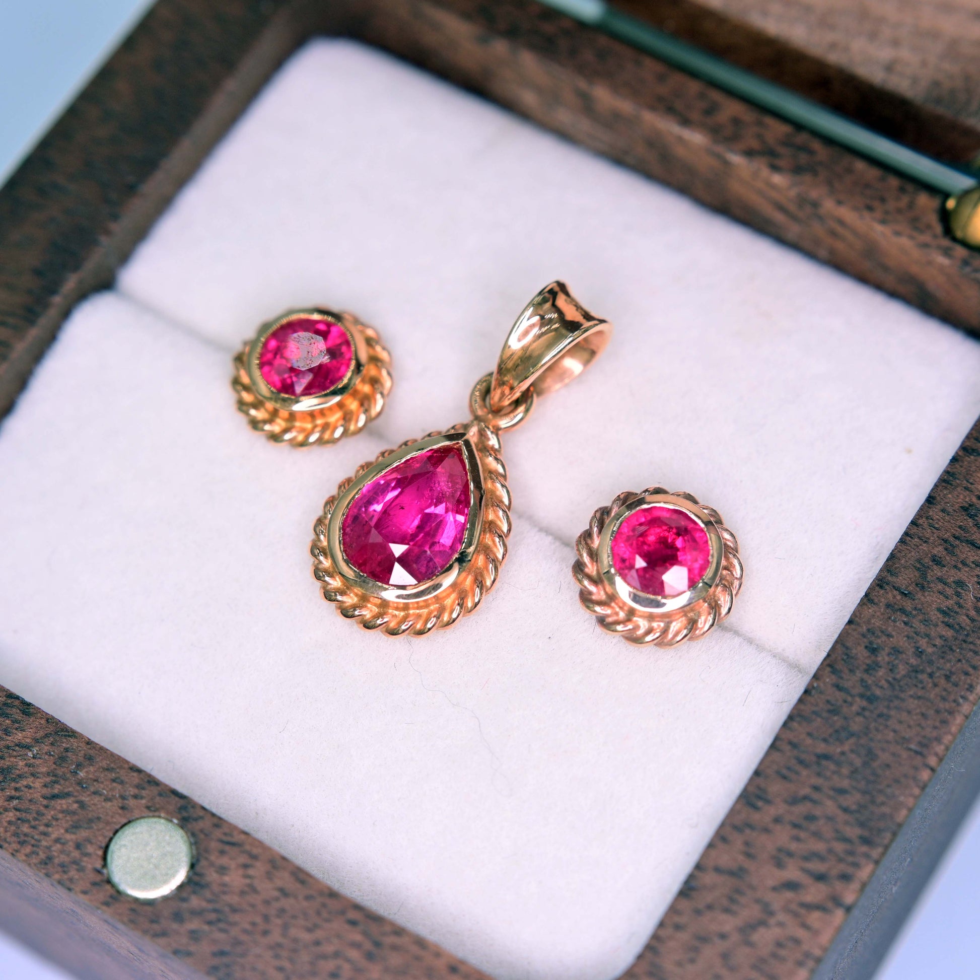 Ruby earrings and pendant set in 14k rose gold
