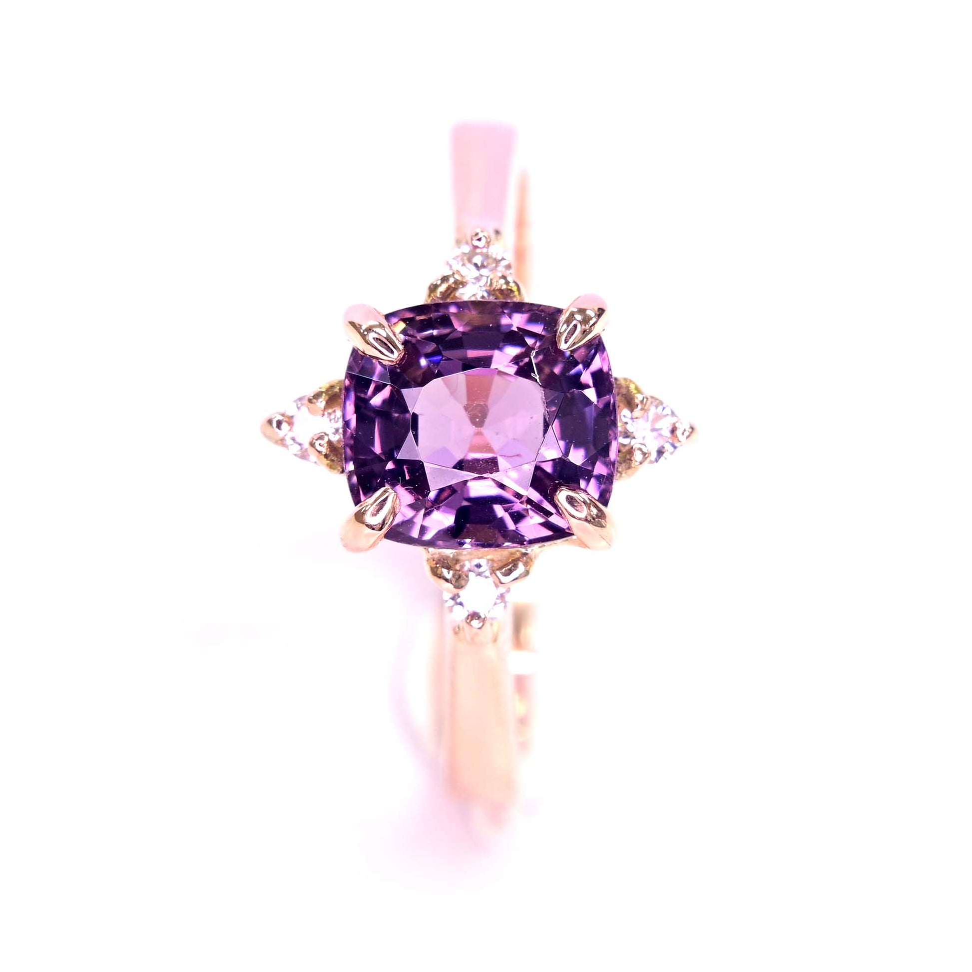 Pink spinel and diamonds set in 14k rose gold
