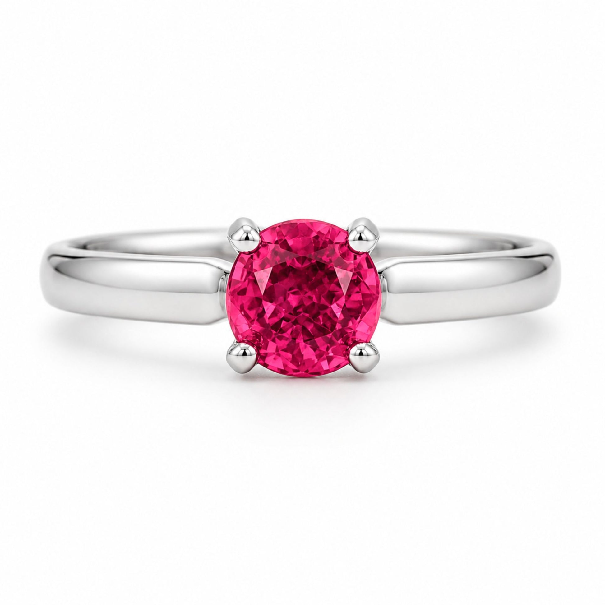Round ruby ring set in 18K white gold with four-prong setting