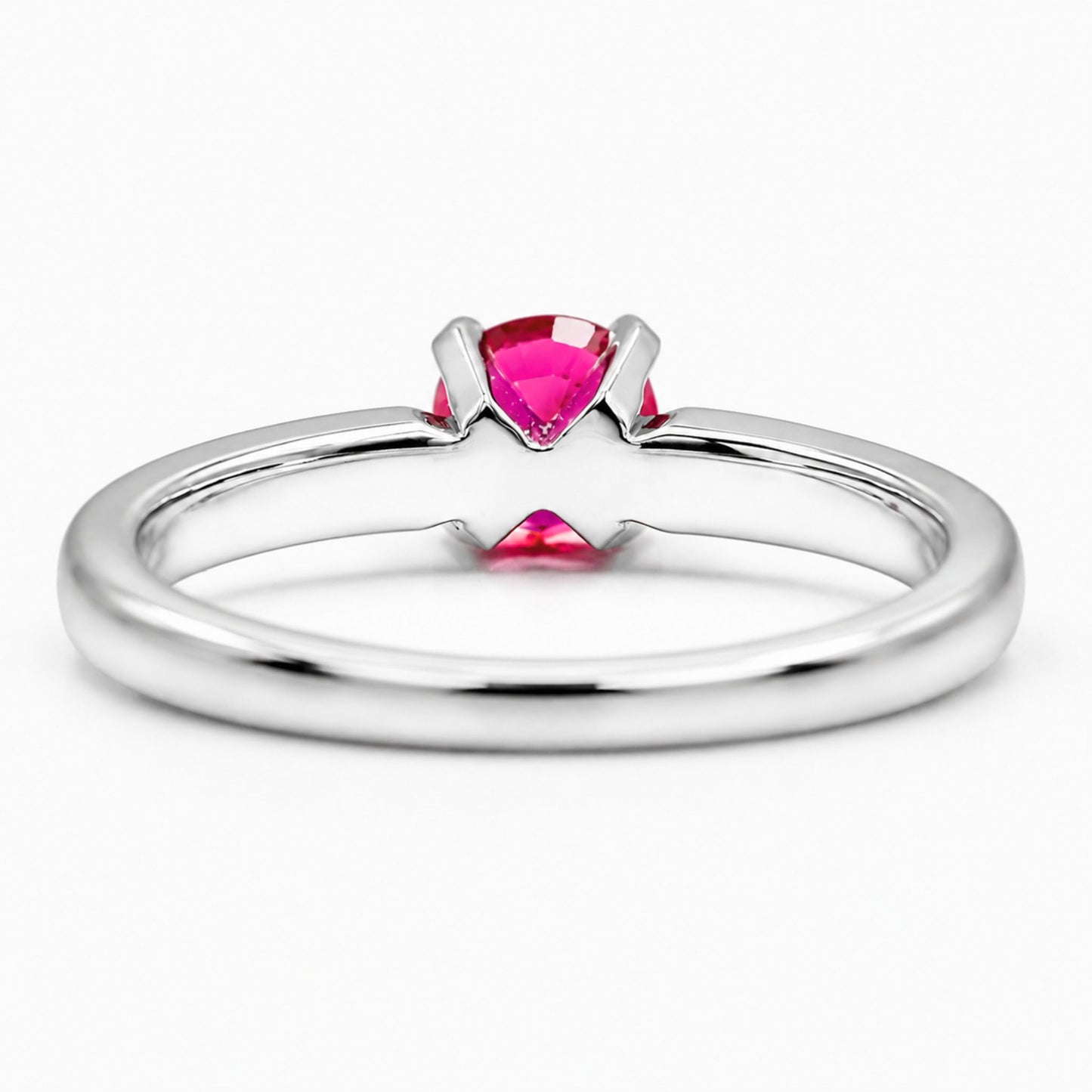 18K white gold ruby ring featuring a vivid round ruby gemstone