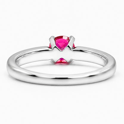 18K white gold ruby ring featuring a vivid round ruby gemstone